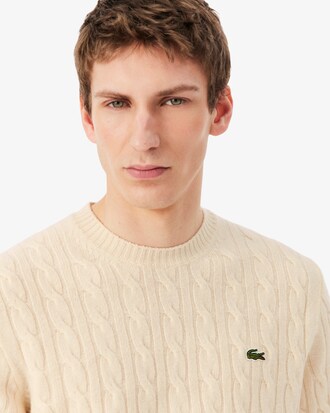 Maglione girocollo a trecce in lana cardata