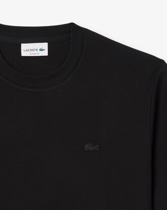 T-shirt con ricamo caratteristico