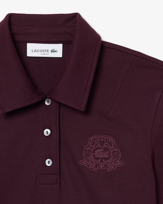 Polo slim fit in piqu&eacute; elasticizzato con ricamo