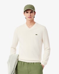 Maglione monocromatico in cotone con scollo a V