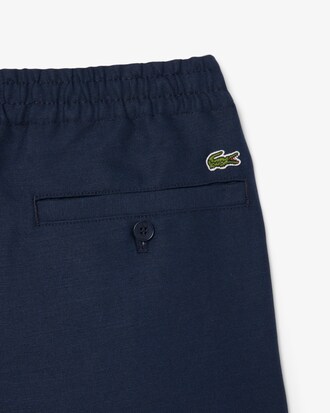 Pantaloni regular fit in twill di lino