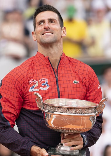 Novak Djokovic wearing Lacoste wins his 23rd Grand Slam title