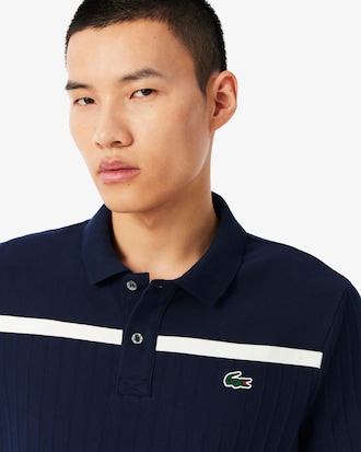 Polo da tennis Ultra Dry con badge Accent Heritage