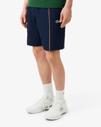 Shorts sportivi con bordo decorativo in taffet&agrave; a rombi