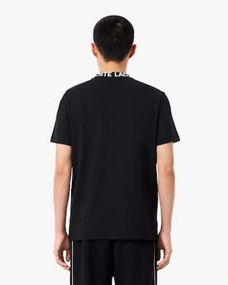 T-shirt in piqu&eacute; con marchio jacquard