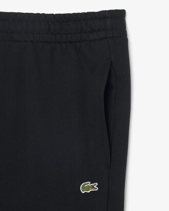 Pantaloni della tuta tapered fit in tessuto felpato