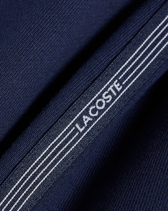 Shorts in tessuto felpato con striscia con logo regular fit