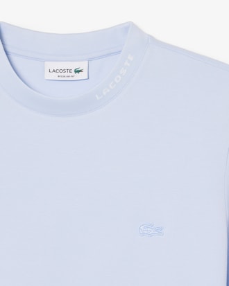 T-shirt in piqu&eacute; con marchio jacquard