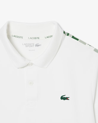 Polo da tennis a righe Ultra-Dry con marchio