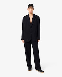 Pantaloni da abito oversize in piqu&eacute; fluido