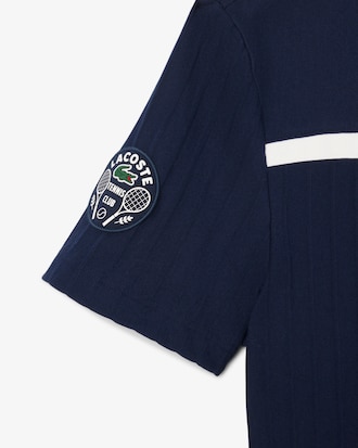 Polo da tennis Ultra Dry con badge Accent Heritage