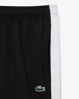 Shorts sportivi con banda in taffet&agrave; a rombi