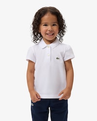 Polo in mini piqu&eacute; con colletto smerlato