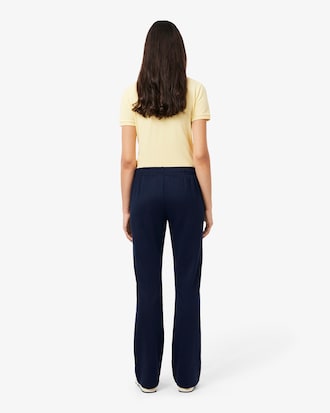 Pantaloni felpati taglio svasato con pieghe