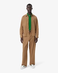 Pantaloni loose fit in twill a pieghe