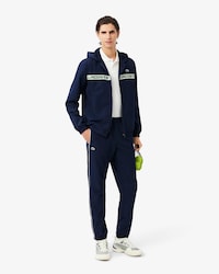 Tuta da tennis con logo a righe