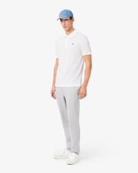 Pantaloni della tuta tapered fit in tessuto felpato