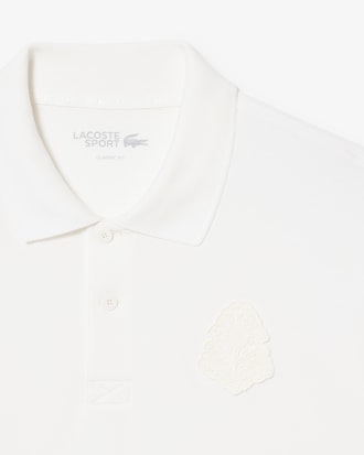 Polo da golf in mini piqu&eacute; elasticizzato con stemma