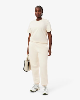 Pantaloni in tessuto felpato con logo goffrato