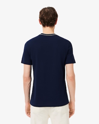 T-shirt in piqu&eacute; elasticizzato con colletto a righe
