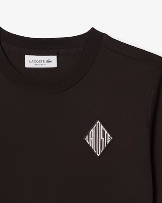 T-shirt in cotone con stemma Lacoste
