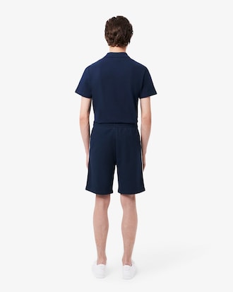 Shorts in cotone felpato con profili con logo