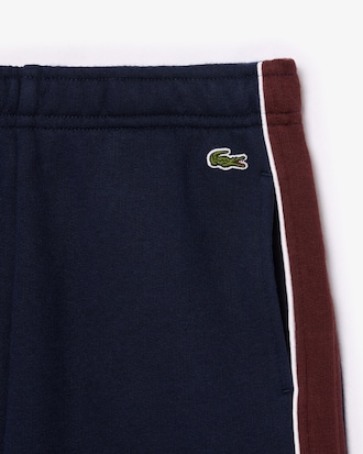 Shorts in pile con righe a contrasto