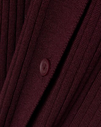 Abito con colletto a polo in lana merino a maglia 3D