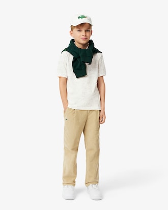Polo in mini piqué con stampa fiore