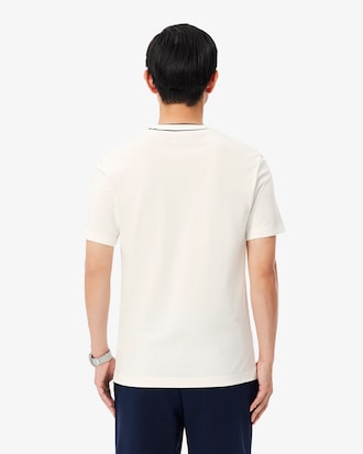 T-shirt in piqu&eacute; elasticizzato con colletto a righe
