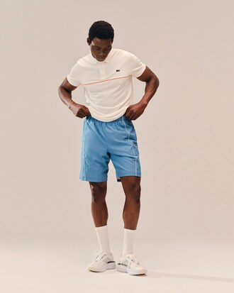 Shorts sportivi con bordo decorativo in taffet&agrave; a rombi