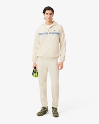 Tuta da tennis con logo a righe