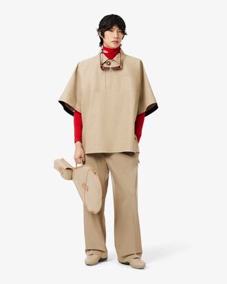 Polo oversize impermeabile Lacoste x Mackintosh