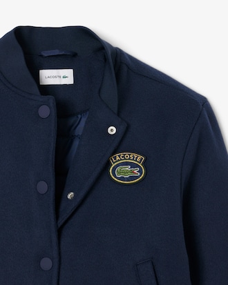 Bomber in lana con stemma coccodrillo