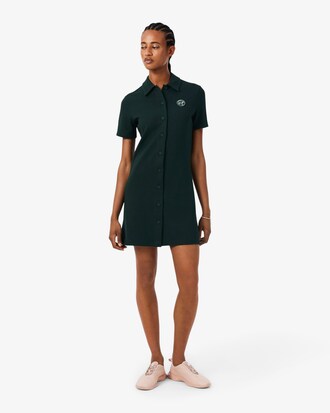Piqu&eacute; jurk met Polokraag en Tennisbadge Accenten