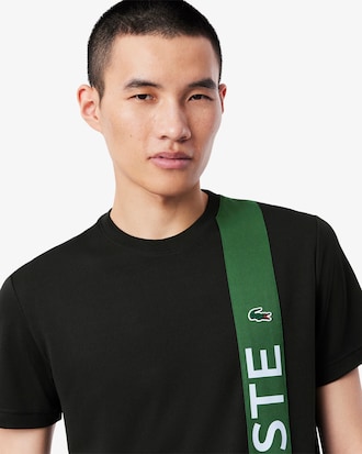 T-shirt Desportiva com Marca Estampada e Tecnologia Ultra-Dry.