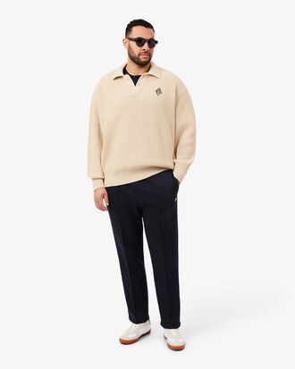 Sweater com Gola de Polo, Nervuras Peroladas e Emblema