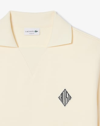 Polo Loose Fit em Felpa com Detalhe de Emblema