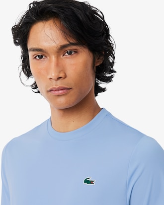 T-shirt Desportiva Leve El&aacute;stica com Prote&ccedil;&atilde;o UV