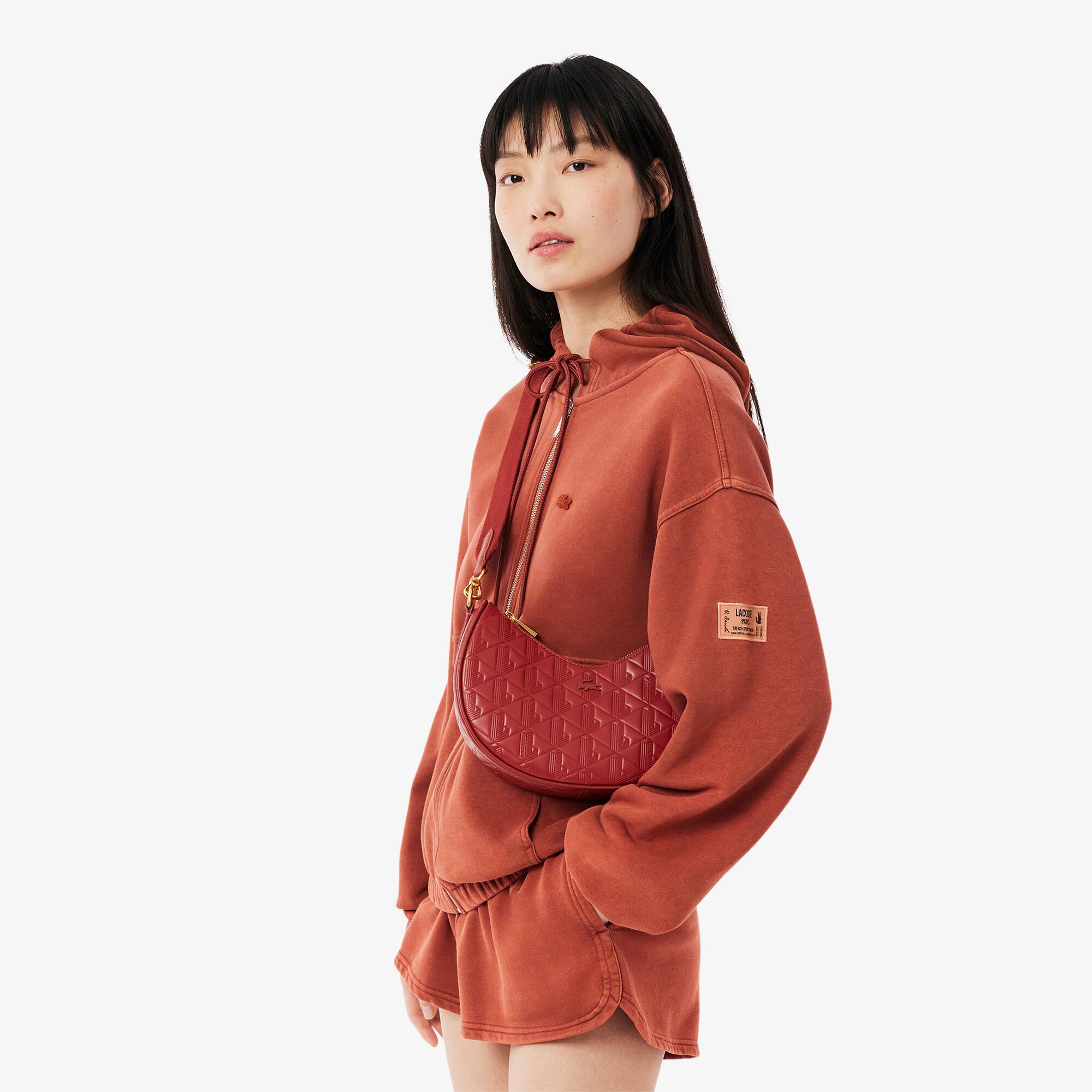 Maheki Embossed Leather Half Moon Purse - Women's Cross Body