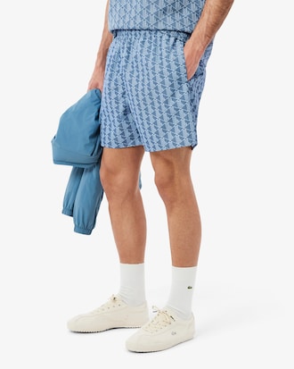 Mid Length Monogram Print Swim Trunks