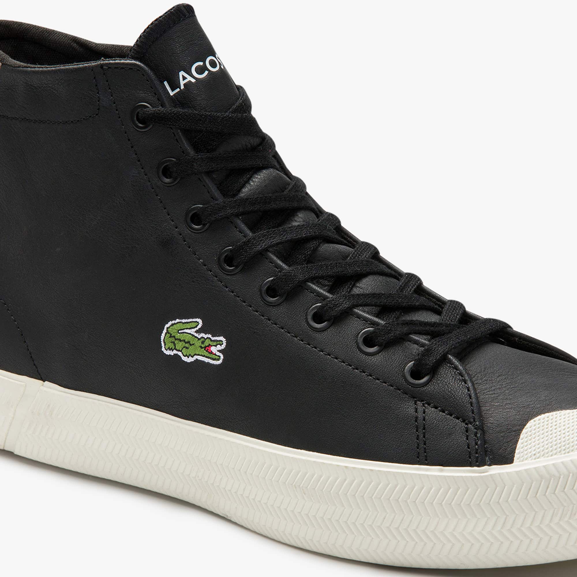 lacoste mid top trainers